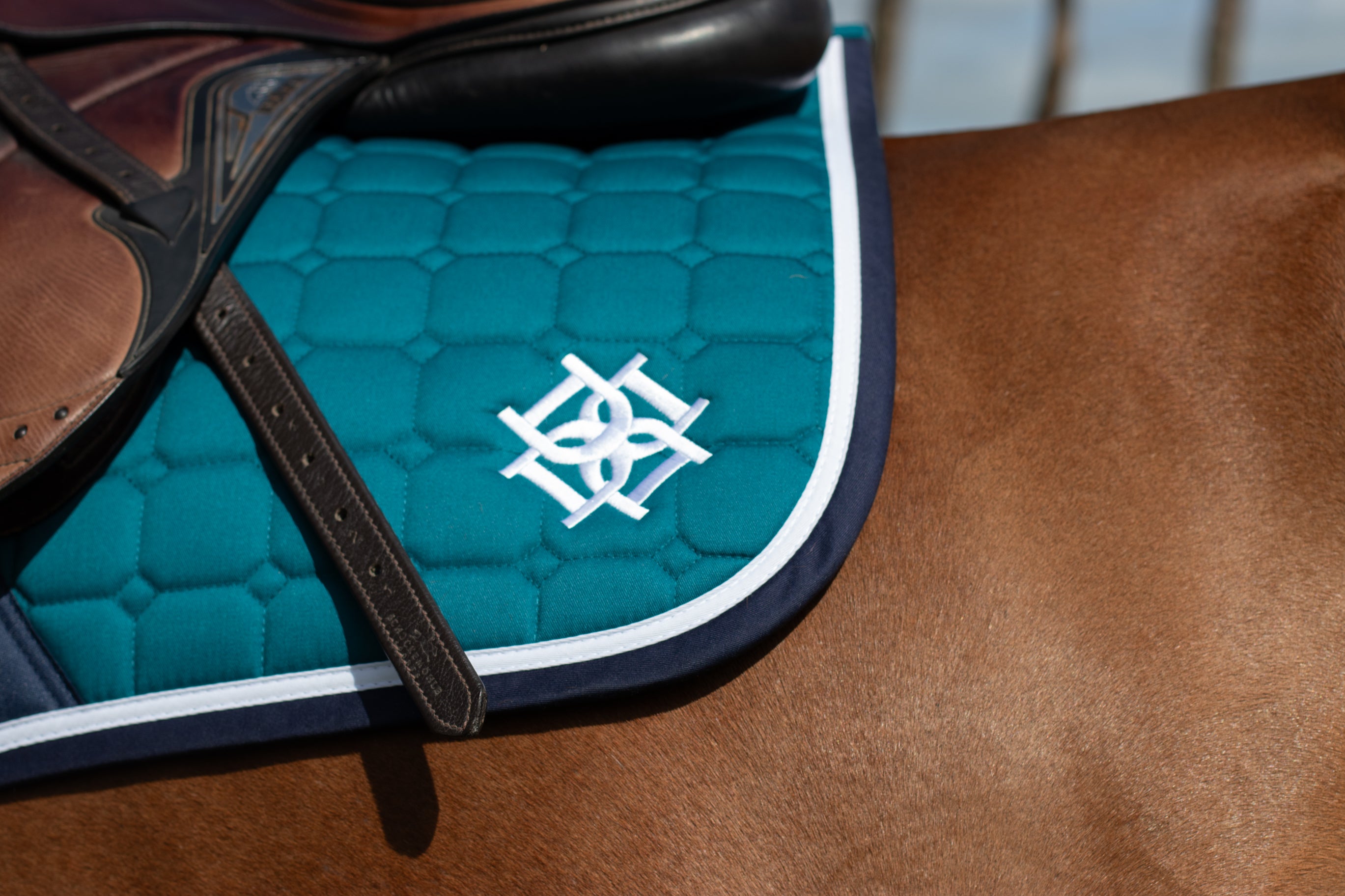Dapple Equestrian Teal Saddle Pad with White & Navy piping and trim